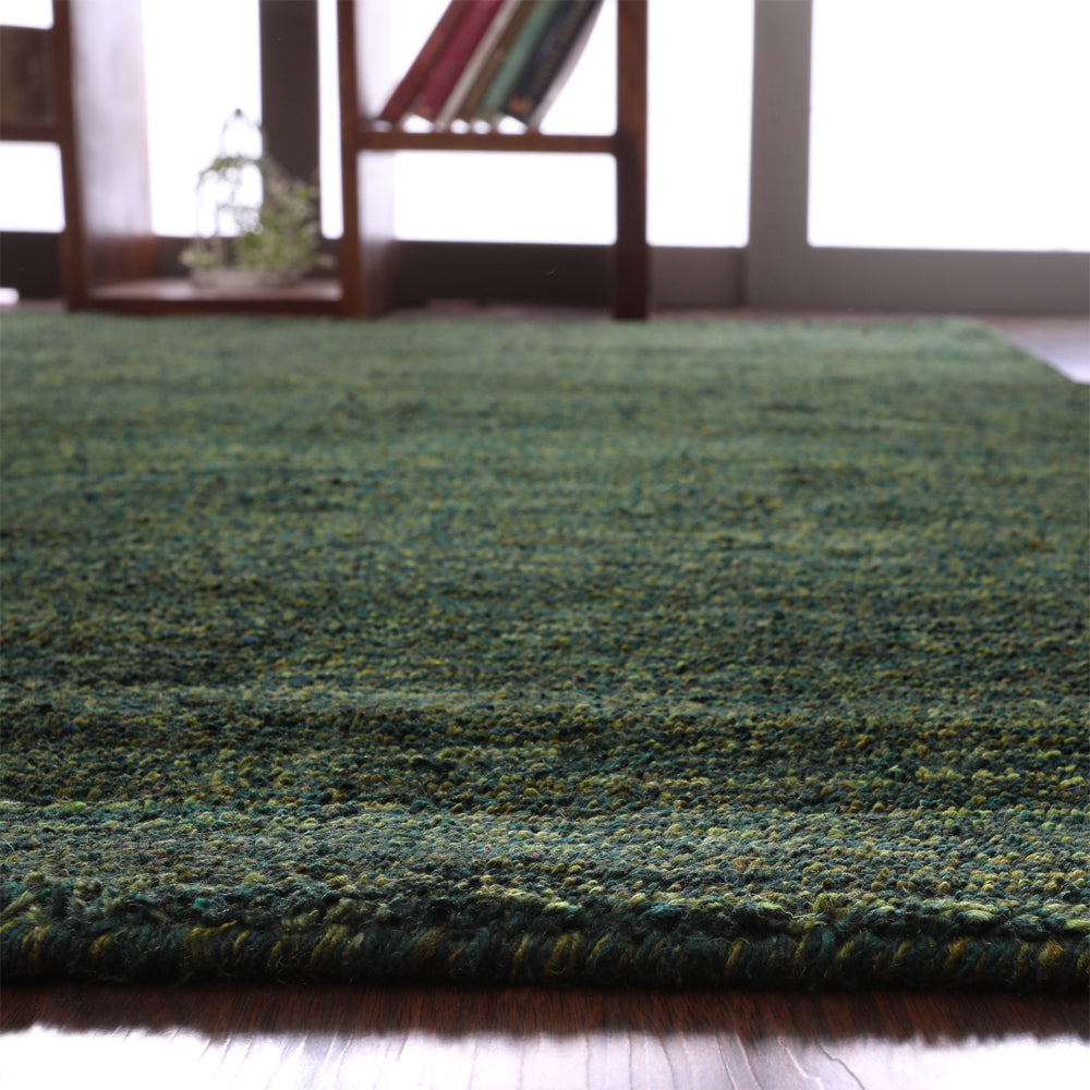hand-knotted-loom-silk-rectangle-area-rug-solid-dark-green-closeup 3