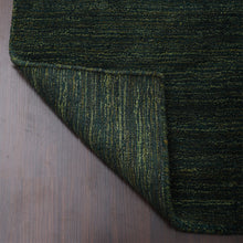 hand-knotted-loom-silk-rectangle-area-rug-solid-dark-green-closeup 5