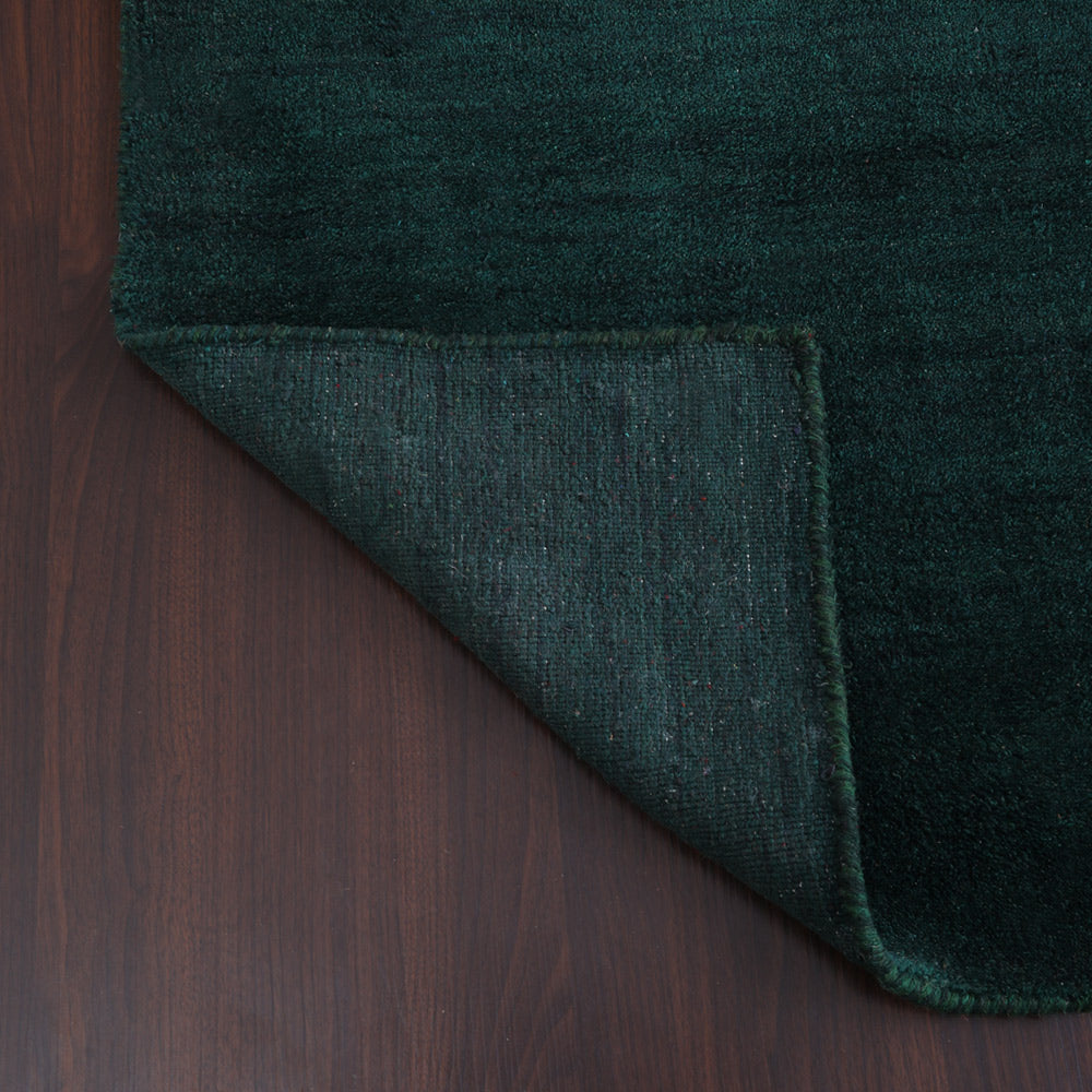 hand-knotted-loom-silk-runner-area-rug-solid-dark-green-closeup 5