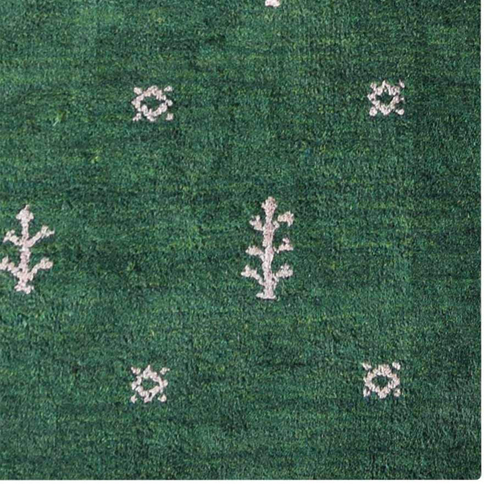 hand-knotted-loom-silk-area-rug-contemporary-dark-green-closeup 1