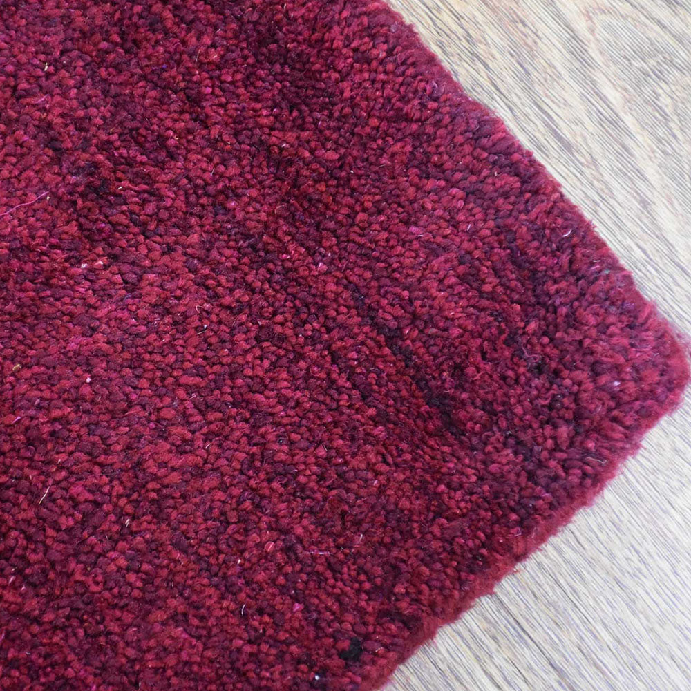 hand-knotted-silk-area-rug-contemporary-dark-red-closeup 2