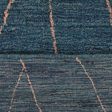 hand-knotted-loom-silk-area-rug-geometric-light-blue-closeup 1