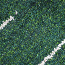 hand-knotted-silk-contemporary-dark-green-rug-closeup 1