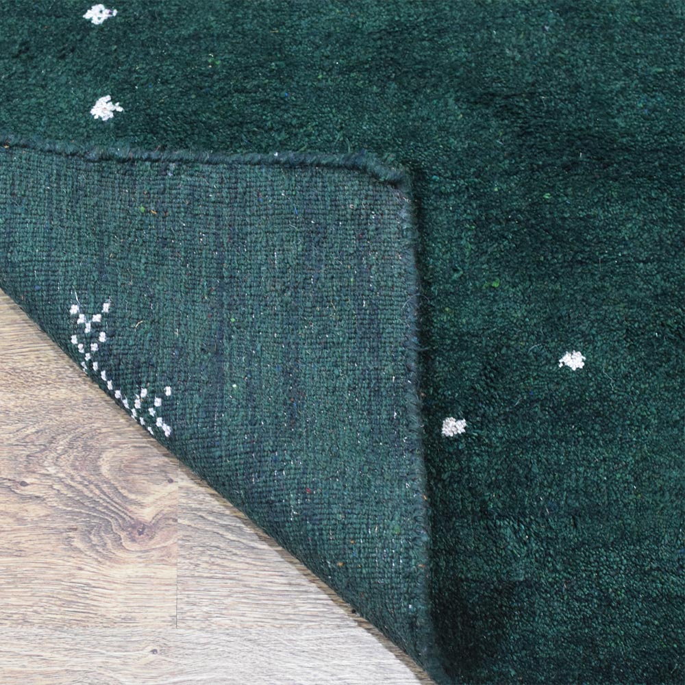 hand-knotted-loom-silk-mix-contemporary-dark-green-rug-closeup 3