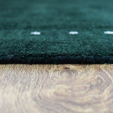 hand-knotted-loom-silk-mix-contemporary-dark-green-rug-closeup 4