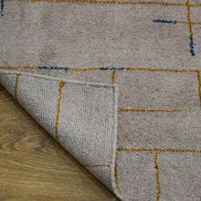 Hand-Knotted-Contemporary-Handmade-beige-gold-rug-closeup 3