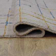 Hand-Knotted-Contemporary-Handmade-beige-gold-rug-closeup 5