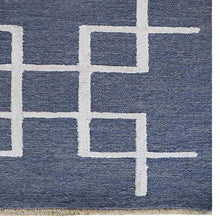 Handmade-silk-and-wool-geometric-area-rug-closeup-1