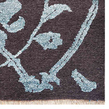 Handmade-silk-and-wool-charcoal-floral-area-rug-closeup-1