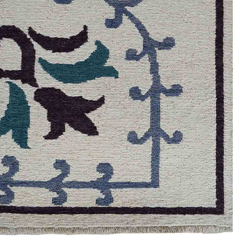 hand-knotted-sumak-wool-area-rug-floral-white-closeup-1
