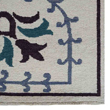 hand-knotted-sumak-wool-area-rug-floral-white-closeup-1