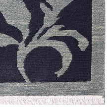 hand-knotted-sumak-multicolor-floral-area-rug-closeup-1