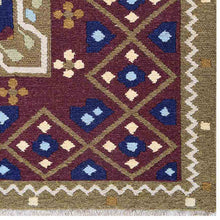 hand-knotted-sumak-blue-rust-oriental-rug-closeup-1