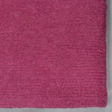 hand-knotted-tibbati-wool-area-rug-solid-pink-closeup-2