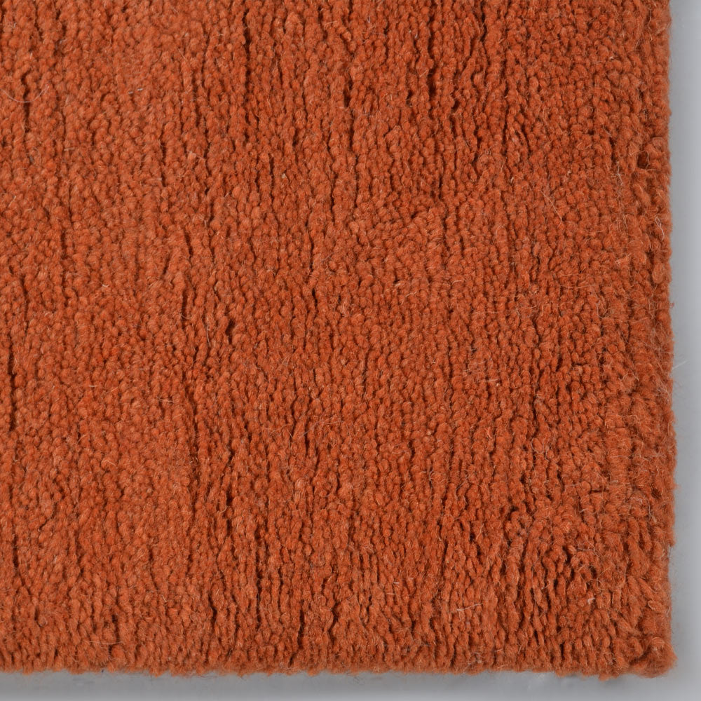 hand-knotted-tibbati-wool-solid-orange-area-rug-closeup-2