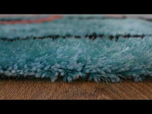 Spiraled Hand Tufted Rug — video