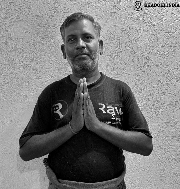 Rupesh Ray, hand-tufted rug weaver in Bhadohi, India
