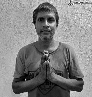 Dharampal, shaggy rug weaver in India